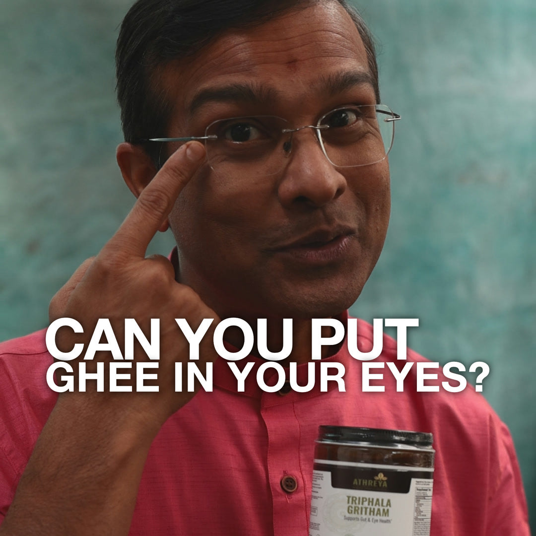 Vaidya Jay with a jar of Athreya Triphala Gritham, with the title Can you put ghee in your eyes?